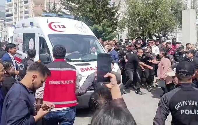 Investigation launched in Turkey after teenager allegedly enters classrooms armed with multiple guns and opens fire on students and teachers, killing nine